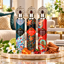 Oriental Fragrances Royale, Amber and Sandalwood Air Freshener Spray Set, 900ml total, featuring decorative aerosol cans for bedrooms, bathrooms and living rooms.
